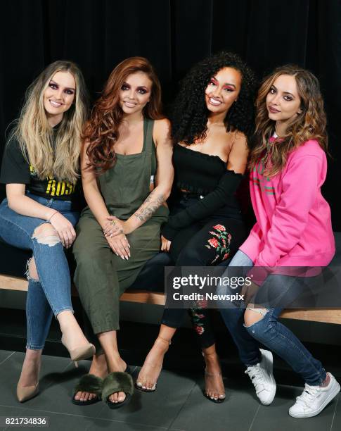 Perrie Edwards, Jesy Nelson, Leigh-Anne Pinnock and Jade Thirlwall of Little Mix pose during a photo shoot at the Margaret Court Arena in Melbourne,...