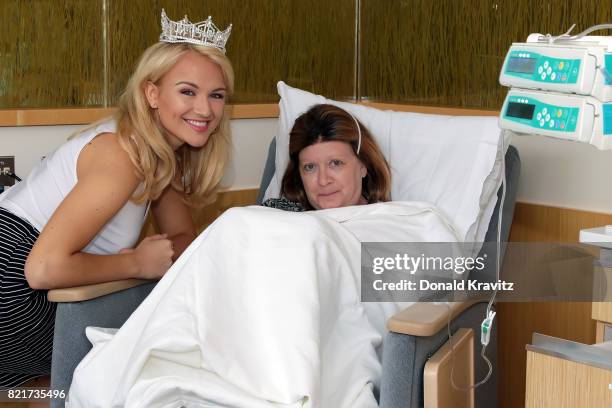 Savvy Shields, Miss America 2017 and patient Nancy Leanza take a photograph at AtlanticCare Regional Medical Center at The AlantiCare Cancer Center...