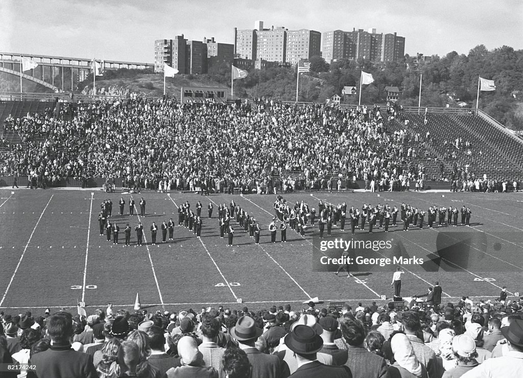 Show at stadium ground, (B&W), elevated view