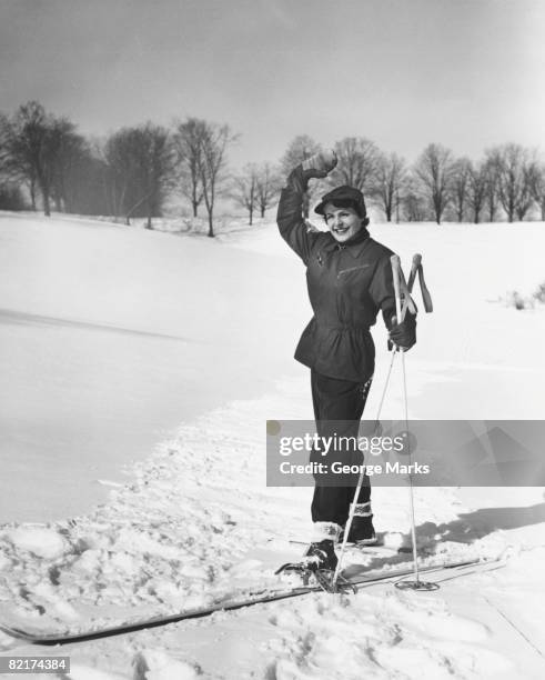 wan cross-country skiing, waving, (b&w) - vintage skier stock pictures, royalty-free photos & images
