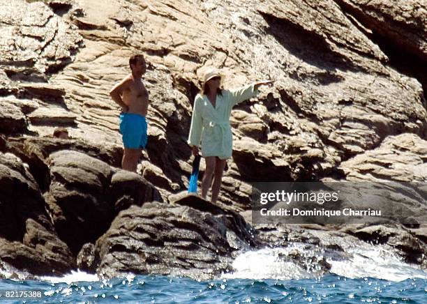 French President Nicolas Sarkozy and his wife Carla Bruni-Sarkozy are pictured during their holidays at Domaine du Cap Negre on August 4, 2008 in...