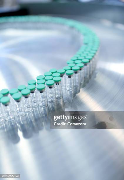 reagents bottle at annulus production line - kraakbeenring stockfoto's en -beelden