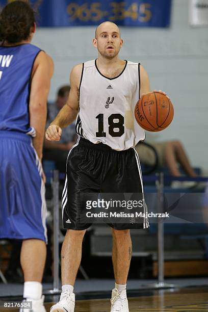 Brian Morrison of the San Antonio Spurs moves the ball up court against the Dallas Mavericks during the Rocky Mountain Review Summer League at the...