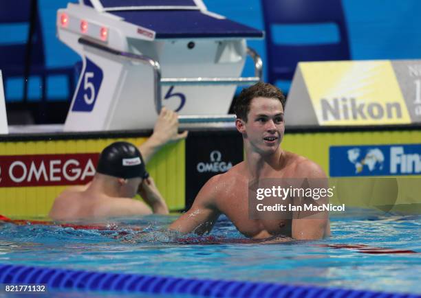 Benjamin Proud of Great Britain celebrates winning the final of Men's 50m Butterfly on day eleven of the FINA World Championships at the Duna Arena...