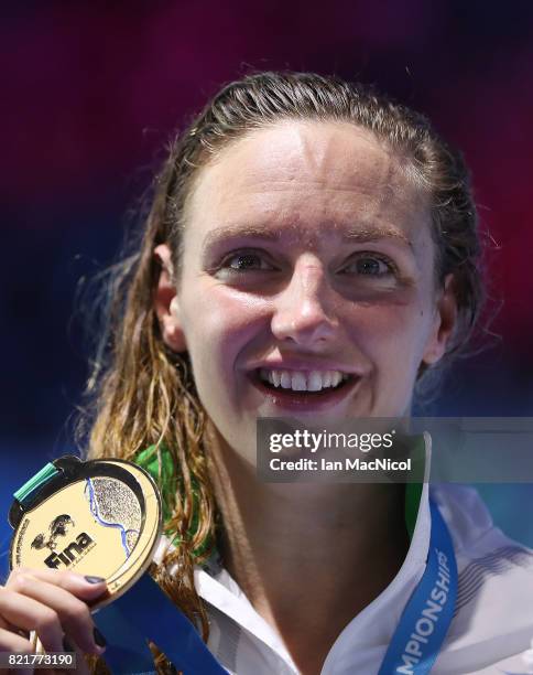 Katinka Hosszu of Hungary poses with her gold medal from the final of Women's 200m IM on day eleven of the FINA World Championships at the Duna Arena...