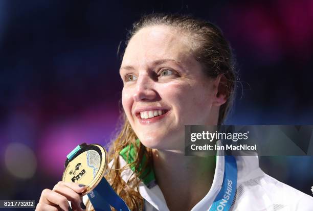 Katinka Hosszu of Hungary poses with her gold medal from the final of Women's 200m IM on day eleven of the FINA World Championships at the Duna Arena...