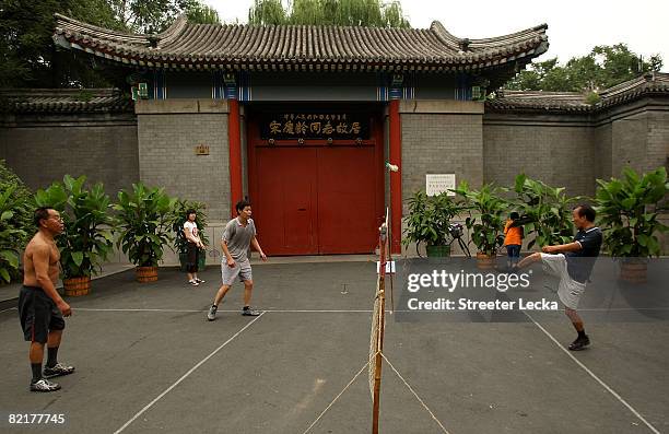 Group of men play jianzi ahead of the Beijing 2008 Olympic Games on August 5, 2008 in Beijing, China.