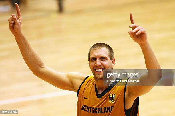 Dirk Nowitzki of Germany gestures during the Basketball practice session held at Shijingshan Gymnasium ahead of the Beijing 2008 Olympics on August...