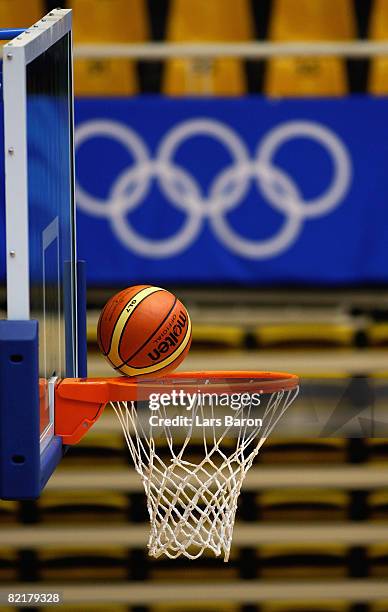 The ball drops through the hoop as the German team train during the Basketball practice session held at Shijingshan Gymnasium ahead of the Beijing...