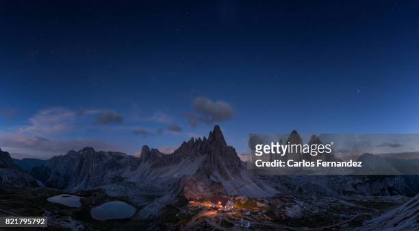 tre cime di lavaredo at night - hut mountains stock pictures, royalty-free photos & images