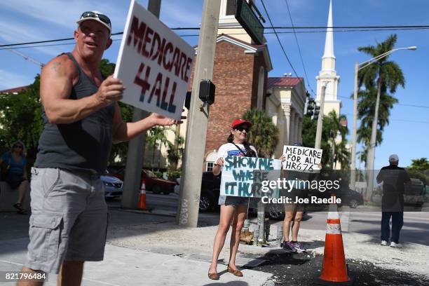 Allen Naismith and PJ Espinal join with other protesters against Republican senators who have not spoken up against Affordable Care Act repeal and...