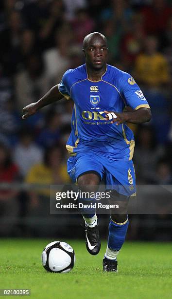 Lassana Diarra of Portsmouth runs with the ball during the pre season friendly match between Oxford United and Portsmouth at the Kassam Stadium on...