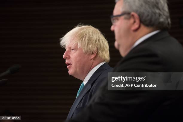 Britain's Foreign Secretary Boris Johnson speaks to the media during a joint press conference with New Zealand's Foreign Minister Gerry Brownlee at...