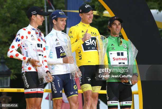 Best climber Warren Barguil of France and Team Sunweb, best young rider Simon Yates of Great Britain and Orica-Scott, winner Christopher Froome of...