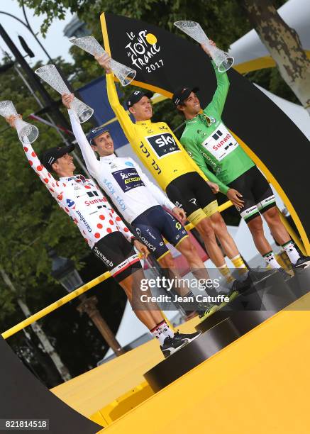 Best climber Warren Barguil of France and Team Sunweb, best young rider Simon Yates of Great Britain and Orica-Scott, winner Christopher Froome of...