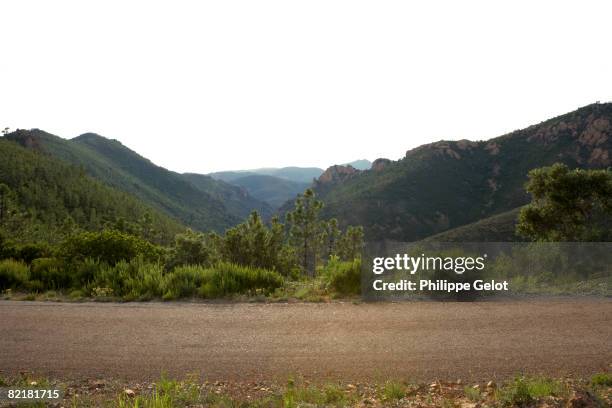 road from profile, hills in the background - var valley stock pictures, royalty-free photos & images