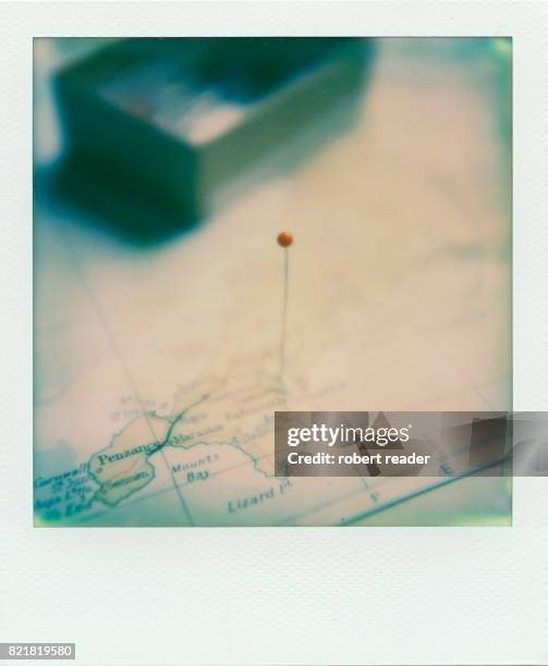 polaroid photograph of map with red pin location marker - truro cornwall stock pictures, royalty-free photos & images