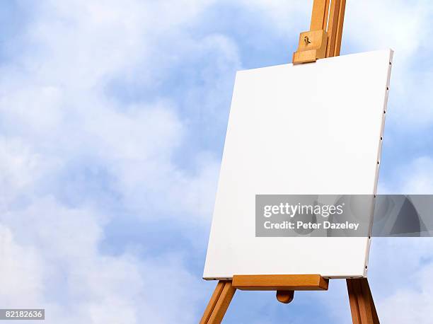 blank artists canvas against blue sky - artist's canvas 個照片及圖片檔