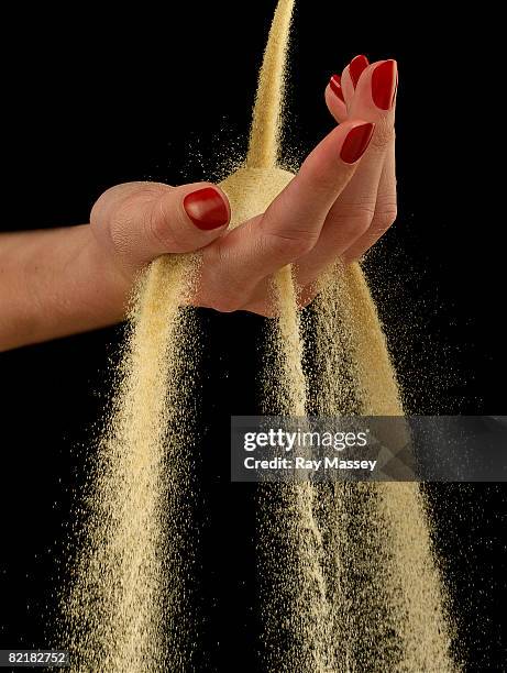 hand and sand - sifting stock pictures, royalty-free photos & images