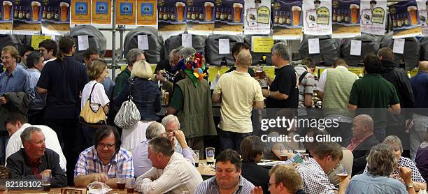 Visitors to the Great British Beer Festival enjoy their pints on August 5, 2008 in London, England. The annual Great British Beer Festival runs from...