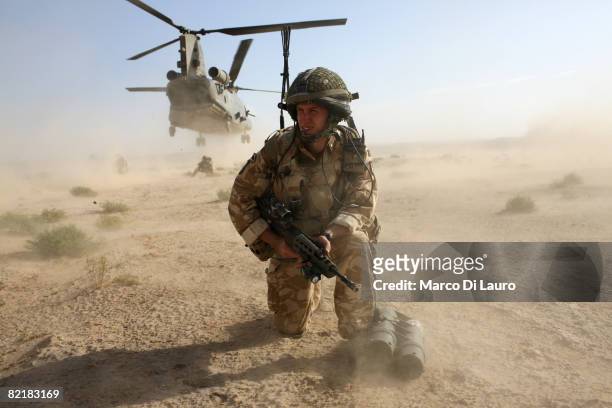 British Army soldiers from the 3rd Battalion The Parachute Regiment conduct strike operation Southern Beast on August 1, 2008 in Maywand District in...