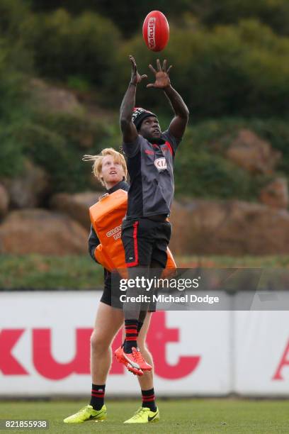 Anthony McDonald-Tipungwuti of the Bombers marks the ball during an Essendon Bombers AFL media session at the Essendon Football CLub on July 25, 2017...