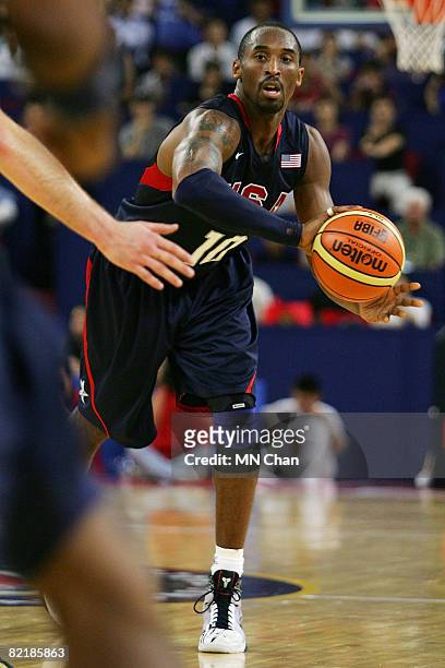 Kobe Bryant of the USA Basketball Men's Senior National Team throws a pass during the USA Basketball International Challenge exhibition game against...