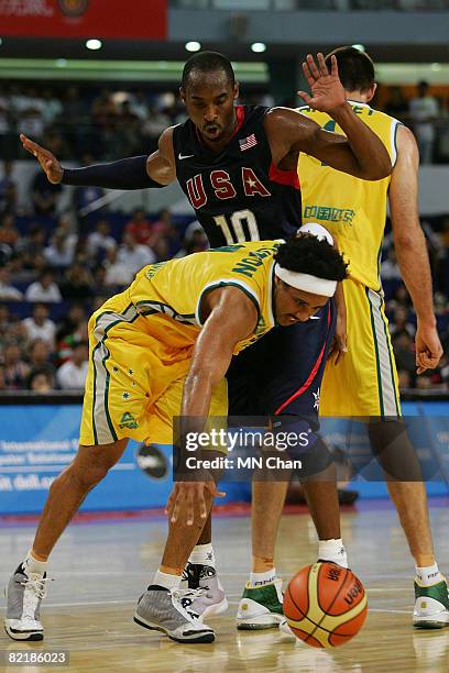 Kobe Bryant of the USA Basketball Men's Senior National Team depends against CJ Bruton of the Australia National Team during the USA Basketball...