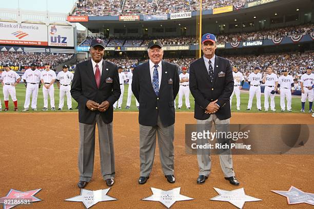 Hall of Famers Rod Carew, Bill Mazeroski, and Ryne Sandberg stand on the field before the 79th MLB All-Star Game at the Yankee Stadium in the Bronx,...