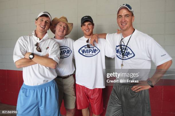 Manning Passing Academy: Cooper Manning, Archie Manning, New York Giants QB Eli Manning, and Indianapolis Colts QB Peyton Manning during camp on...