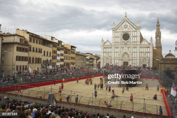 Rossi and Verdi in action during Semifinals at Piazza Santa Croce. Scenic view of the city skyline and the Basilica of Santa Croce. The sport is a...