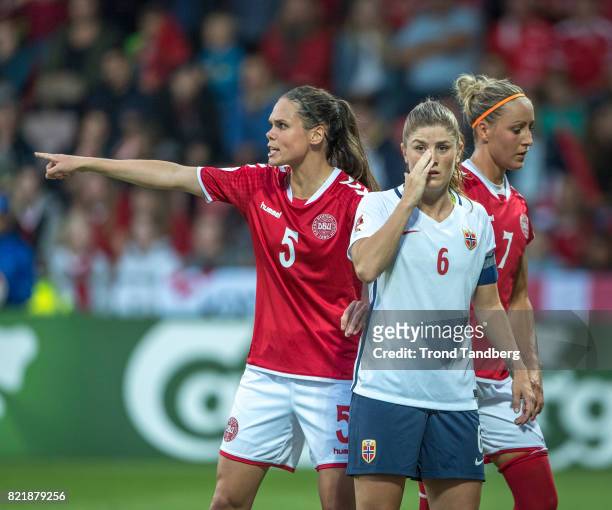 Maren Mjelde of Norway, Simone Boye Sorensen, Sanne Troelsgaard of Denmark during the UEFA Womens«s Euro between Norway v Denmark at Stadion De...