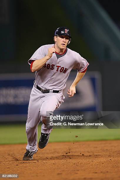 Jason Bay of the Boston Red Sox advances to third base on a single by Jason Varitek in the sixth inning against the Kansas City Royals at Kauffman...