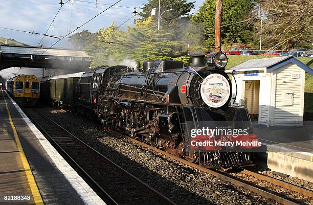 The Parliamentary Express travels through the suburbs of Wellington during the Parliamentary train special from Wellington to Auckland August 6, 2008...