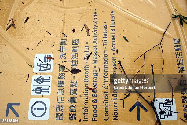 An information board lies lies across a pathway at the Hong Kong Olympic Equestrian Venue in Sha Tin ahead of the Beijing 2008 Olympic Games on...
