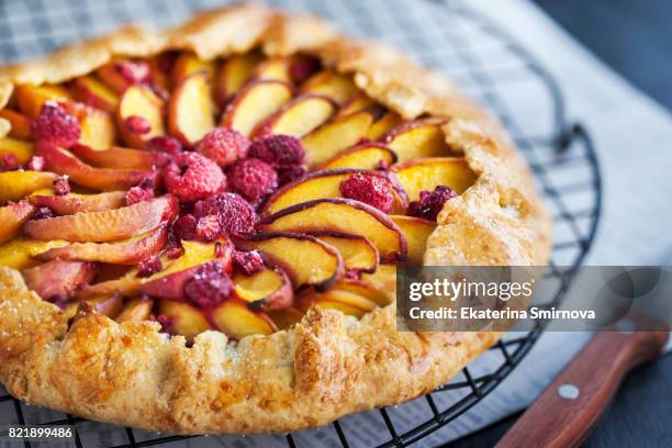 rustic open pie with peach and raspberry (french galette) - tart bildbanksfoton och bilder