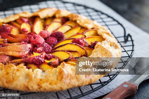Rustic open pie with peach and raspberry (french galette) Rustic open pie with peach and raspberry (french galette)