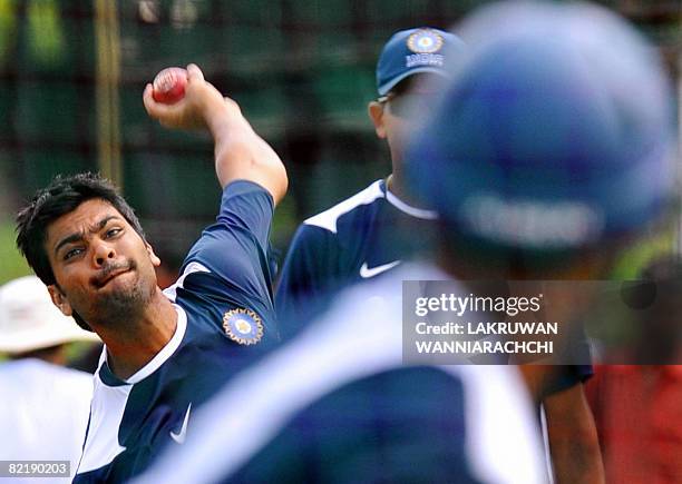 Indian cricketer R.P. Singh delivers a ball during a practice session at The P. Saravanamuttu Stadium in Colombo on August 6, 2008. The Indian...