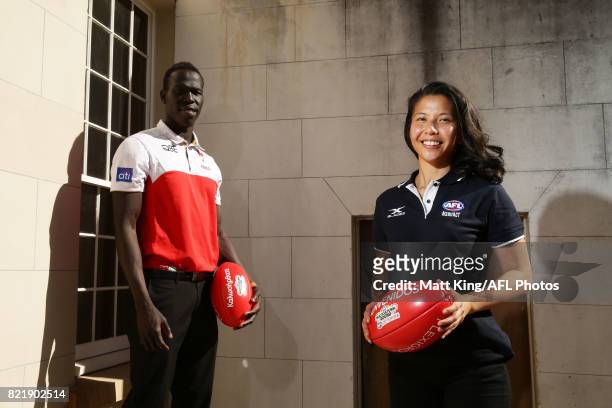 Aliir Aliir of the Sydney Swans and Mai Nguyen of the GWS Giants pose during the AFL Multicultural Round Media Launch at Lachlan's Old Government...