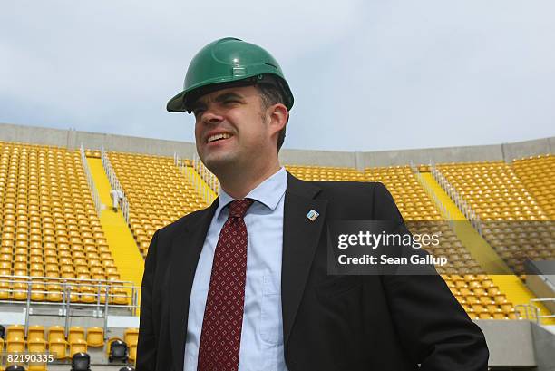 Ulrich Wolter, German Football Federation General Coordinator for the 2011 Women's Football World Championships, tours the new Rudolf-Harbig soccer...