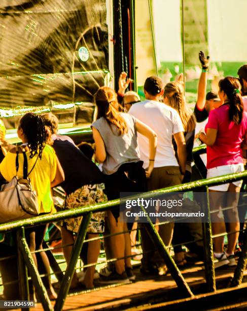 opening of ilhabela sailing week when the parade of sailboats happens in front of the píer da vila in ilhabela, brazil - píer stock pictures, royalty-free photos & images