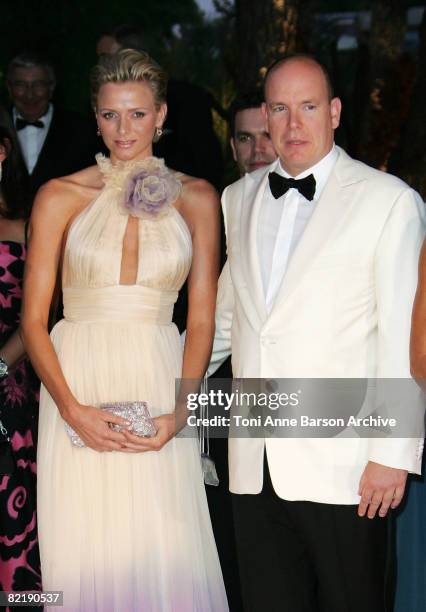 Prince Albert II of Monaco and Charlene Wittstock arrive at the 60th Monaco Red Cross Ball at the Monte-Carlo Sporting Club on August 1, 2008 in...