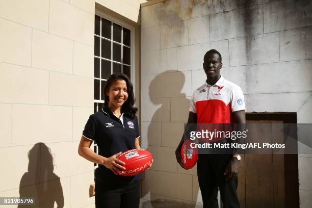 Aliir Aliir of the Sydney Swans and Mai Nguyen of the GWS Giants pose during the AFL Multicultural Round Media Launch at Lachlan's Old Government...
