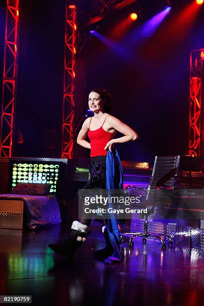 Actress Jolene Anderson performs onstage during a dress rehearsal for the opening night of "Tell Me On A Sunday" at the Glen Street Theatre on August...