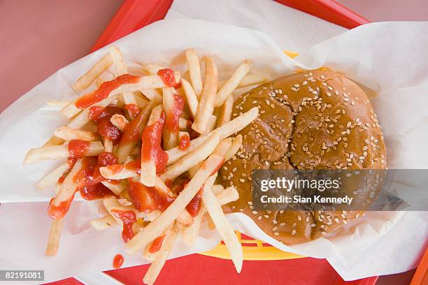 hamburger and french fries on a fast food tray - tray stock pictures, royalty-free photos & images
