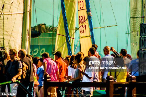 opening of ilhabela sailing week when the parade of sailboats happens in front of the píer da vila in ilhabela, brazil - píer stock pictures, royalty-free photos & images