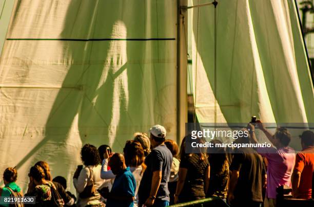 opening of ilhabela sailing week when the parade of sailboats happens in front of the píer da vila in ilhabela, brazil - píer stock pictures, royalty-free photos & images