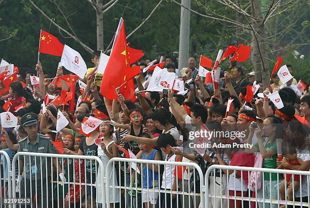 General view of crowd cheering at the flame basin lighting ceremony during the Beijing Olympic torch relay ahead of the Beijing 2008 Olympics at the...