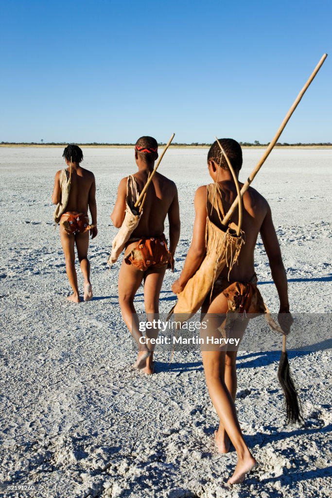 Bushmen dressed in traditional skins.