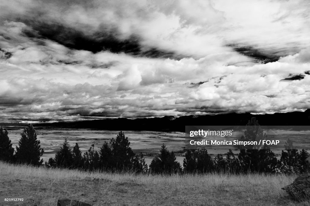 Cloudy sky against landscape